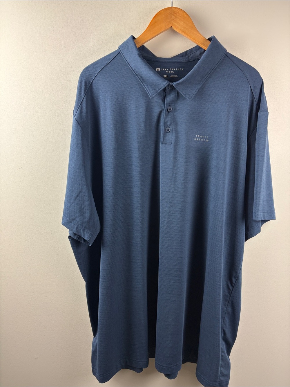 Travis Mathew Navy Performance Polo